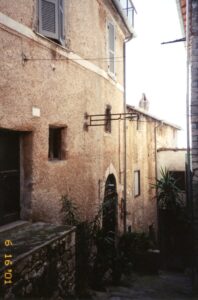 3 a sidewalk leading to second house